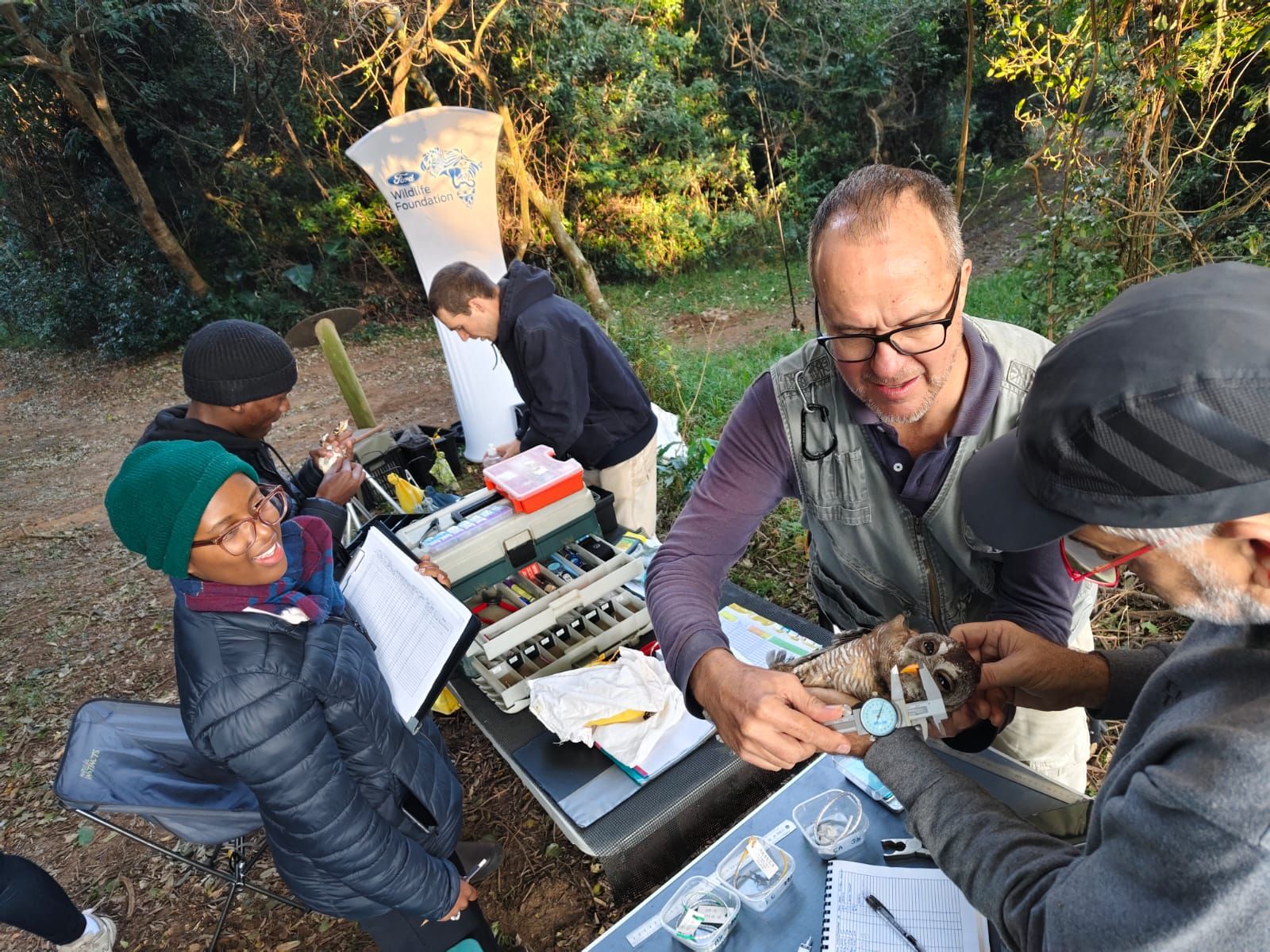 The team ringing birds at a field station